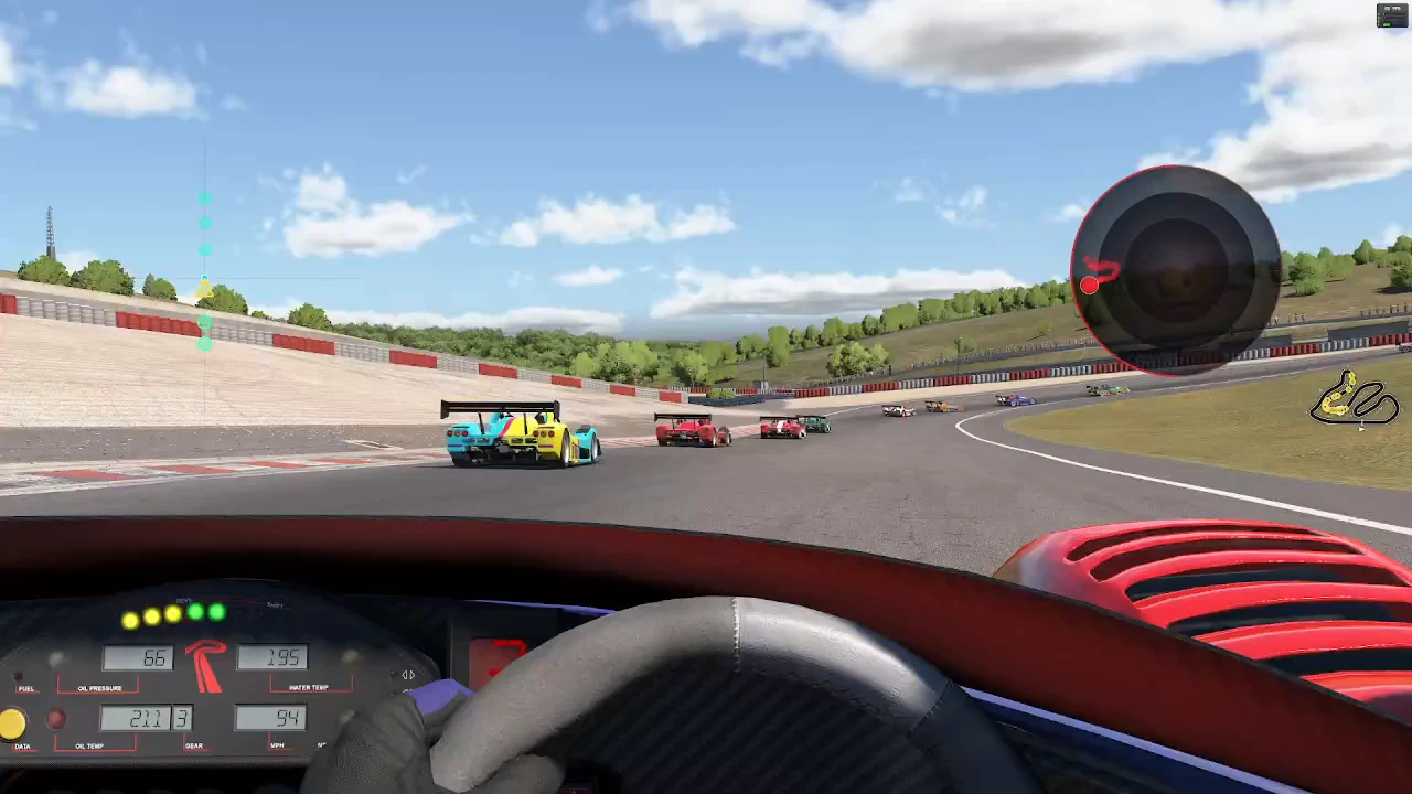 Lynx Vector GripSense display under cornering load while following traffic in iRacing